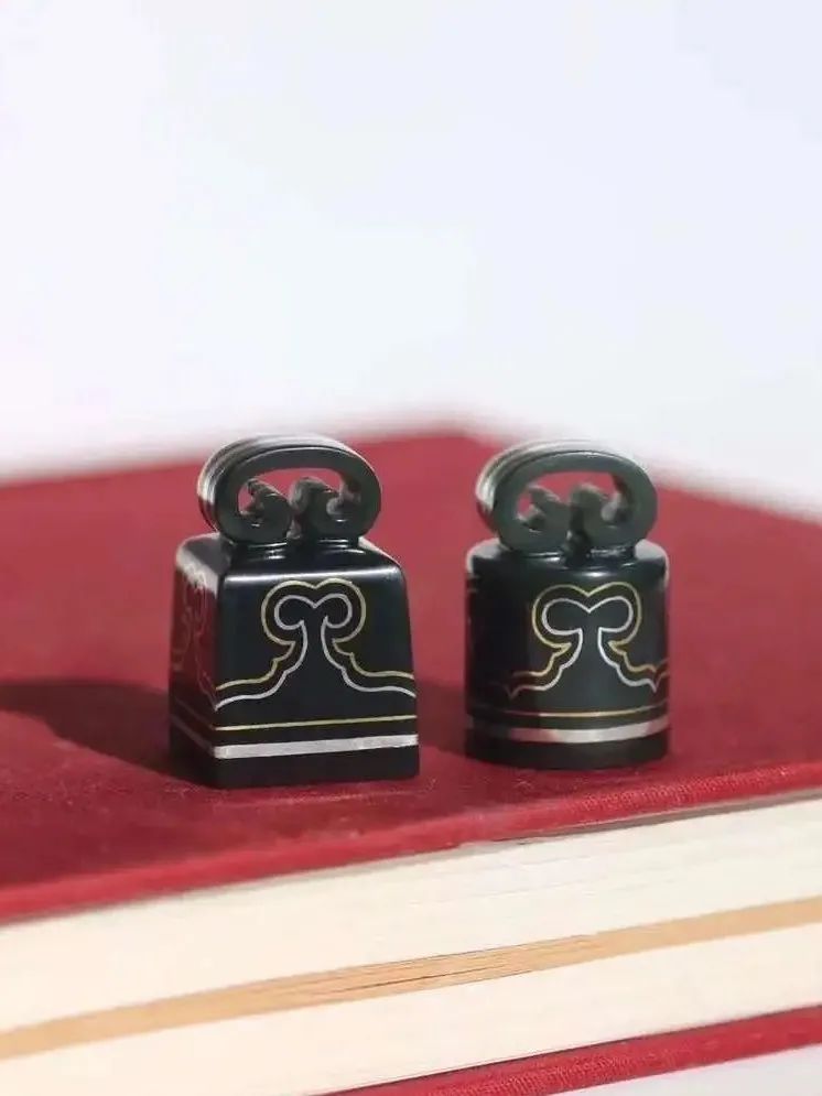 错金银工艺—称心如意锁.运用镶嵌法,可做印章或文玩配饰